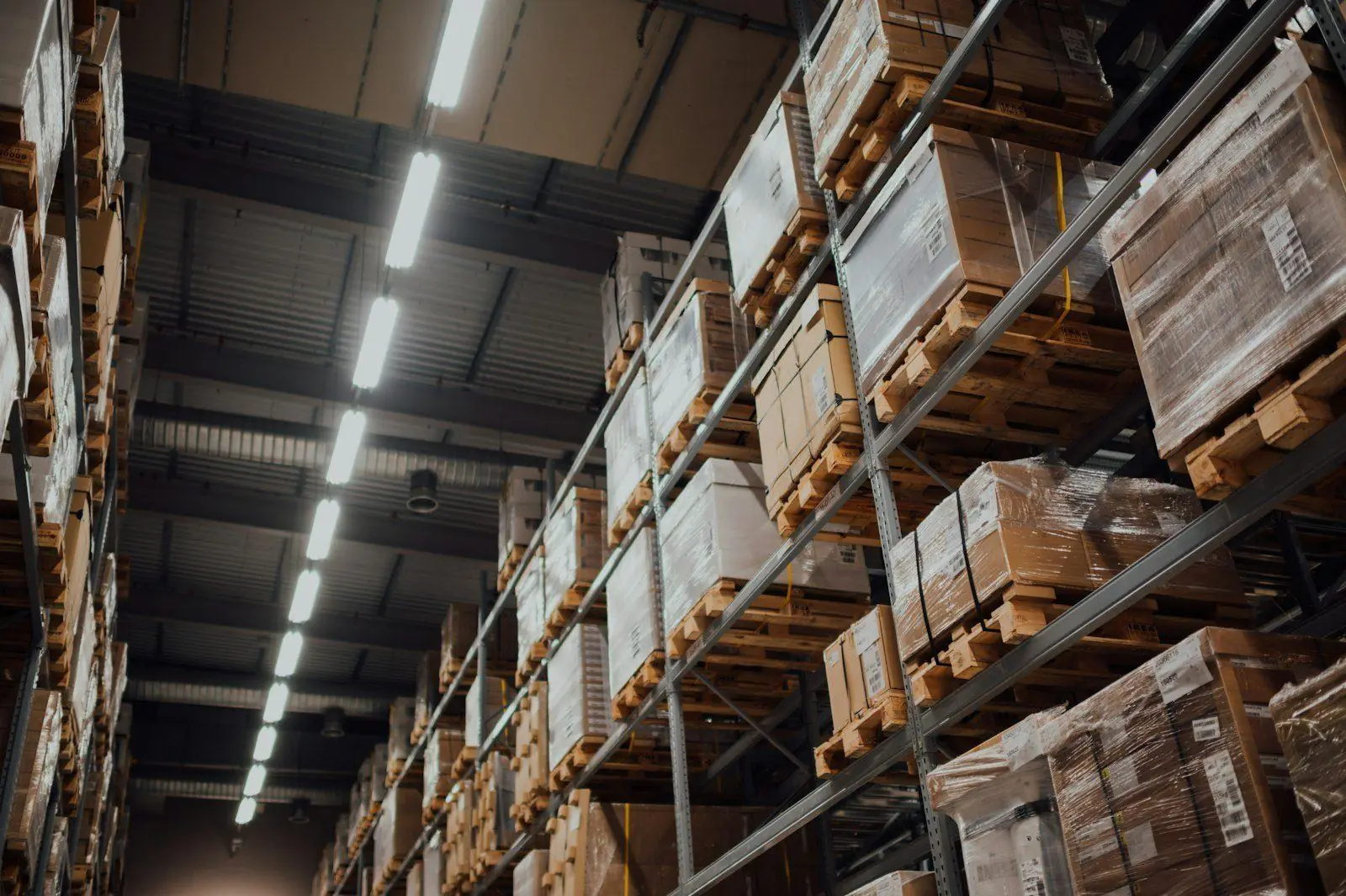 Pharmaceutical distribution racks in a dark warehouse